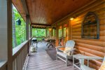 Main Level Covered Deck Offers Ample Seating, Gas Grill, and Hours of Relaxation